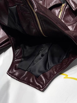 Burgundy faux leather moto jacket black lining detail