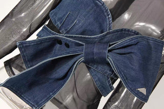Denim bow wrap detail on black sheer mesh top