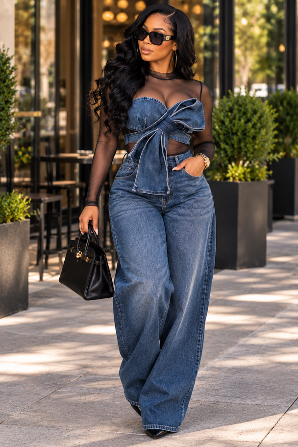 Denim Bow Mesh Zip Top styled with matching denim jeans and black handbag