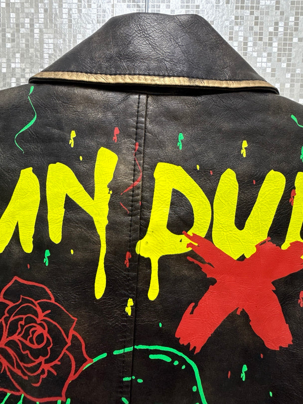 Black graffiti moto jacket back artwork and texture detail